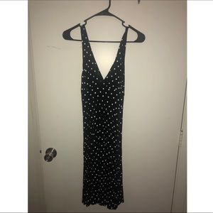 Black dress with white polka dots